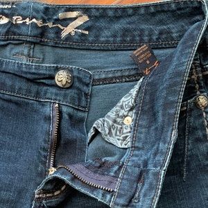 Boot cut jeans and soft yellow short blouse